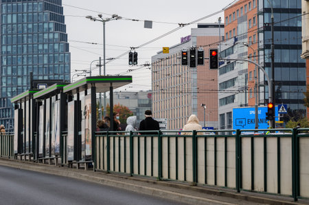 POZNAN - POLAND - 2021: Tram stop - City residents are waiting for the tram to arriveのeditorial素材