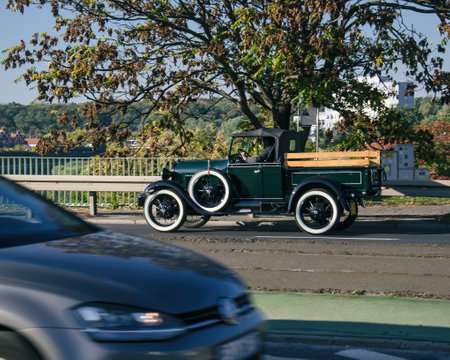 POZNAN - POLAND - 2021: An antique and very old car on the city streetのeditorial素材