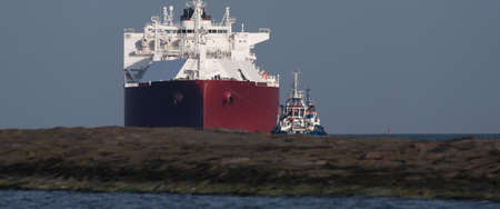 LNG TANKER - Ship with gas supply goes to the port