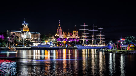 SZCZECIN, WEST POMERANIAN - POLAND - 2021; The DAR MLODZIEZY frigate and other ships moored at representative quay of seaportのeditorial素材