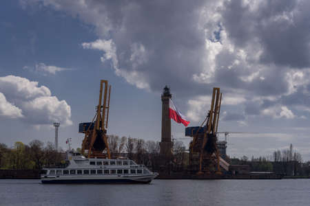 STATE FLAG - Flag of Poland at the lighthouse in Swinoujscieの写真素材