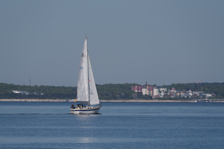 SWINOUJSCIE, WEST POMERANIAN - POLAND - 2022: Sailors on a recreational yacht go to the seaのeditorial素材