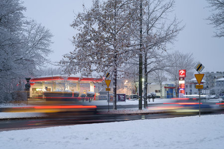 KOLOBRZEG, WEST POMERANIAN - POLAND - 2022: Gas station in a winter cityのeditorial素材