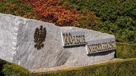 POLCZYN ZDROJ - WEST POMERANIAN - POLAND - 2022: Rock with the emblem of Poland and the inscription "100 Years of Independence"のeditorial素材