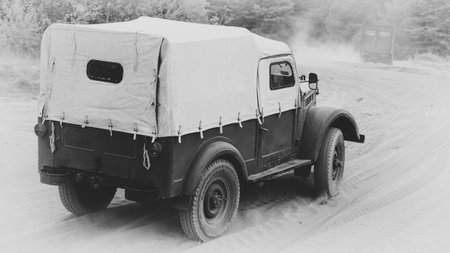 BORNE SULINOWO, WEST POMERANIAN - POLAND - 2022: OLD MILITARY CAR - Russian all-terrain vehicle on a dirt roadのeditorial素材