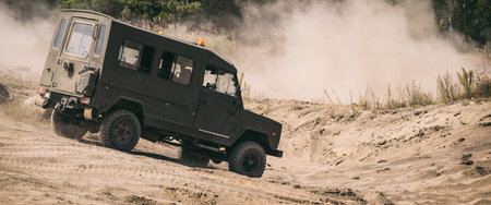 BORNE SULINOWO, WEST POMERANIAN - POLAND - 2022: OLD MILITARY CAR - Polish all-terrain vehicle on a dirt roadのeditorial素材