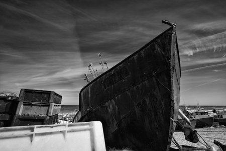 FISHING PORT - Fish boxes and fishing nets on the background of boat