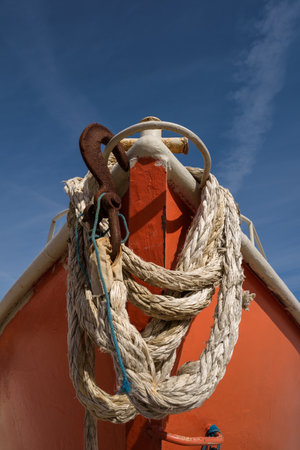 FISHING BOAT - Portrait of a small ship in rays of the sunの写真素材