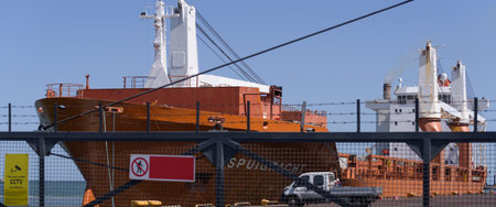GDYNIA, POMERANIAN - POLAND - 2023: Ship moored at the transshipment wharf