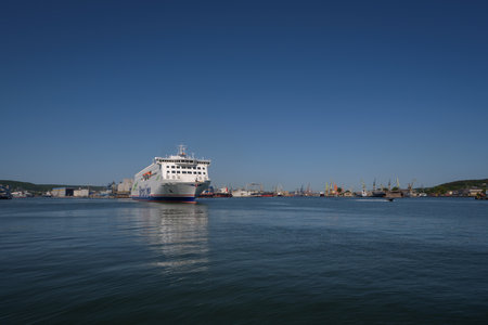 GDYNIA POMERANIAN - POLAND - MAY 30, 2023: Passenger ferry sails through the seaport canal to seaのeditorial素材