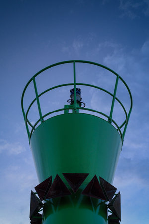 GREEN SIGN BEACON - Marking entrance to the portの写真素材