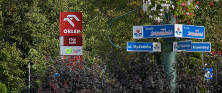 KOLOBRZEG, WEST POMERANIAN - POLAND - SEPTEMBER 19, 2023: Gas station in an urban landscapeのeditorial素材