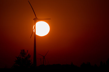 WIND FARM AND SUN - A sunny and hot morning and renewable energy sources