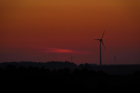 WIND FARM AND SUN - A sunny and hot morning and renewable energy sources