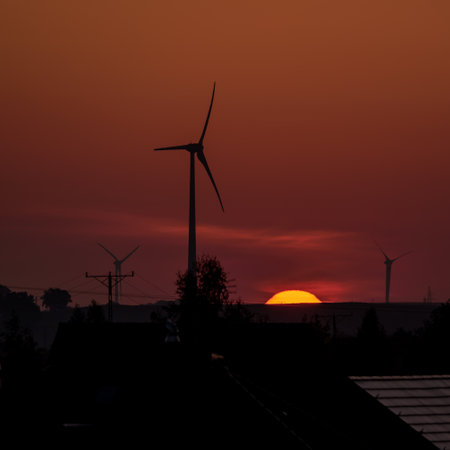 WIND FARM AND SUN - A sunny and hot morning and renewable energy sourcesの写真素材