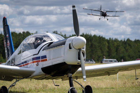 BORNE SULINOWO, WEST POMERANIAN - POLAND - 2022: A light personal plane ZLIN at the airport and an...