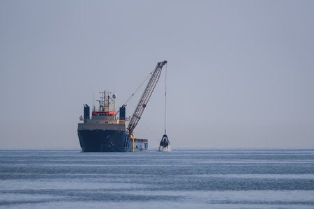 DREDGER - A specialized ship works in the roadstead of a sea port