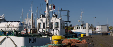 SEA PORT - Pilot boat, mooring lines on the bollard at the quay