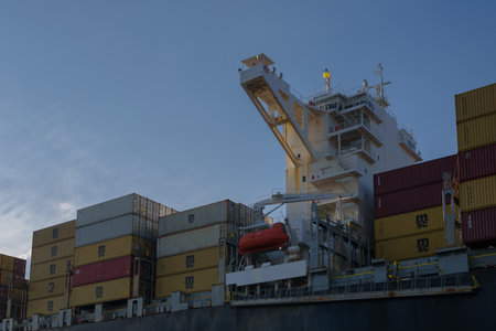 GDYNIA, POMERANIAN REGION - POLAND - MAY 27, 2024: Container ship sails to port with cargo