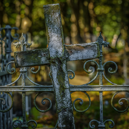 CEMETERY - An old wooden crucifix on a forgotten grave