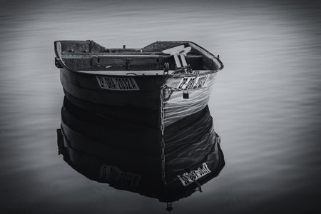 CZAPLINEK, WEST POMERANIAN - POLAND - JULY 23, 2024: Small rowing boat on the lakeのeditorial素材