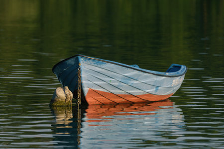 CZAPLINEK, WEST POMERANIAN - POLAND - JULY 23, 2024: Small rowing boat on the lakeのeditorial素材