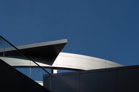 ARCHITECTURE - A modern tall residential building against the blue sky