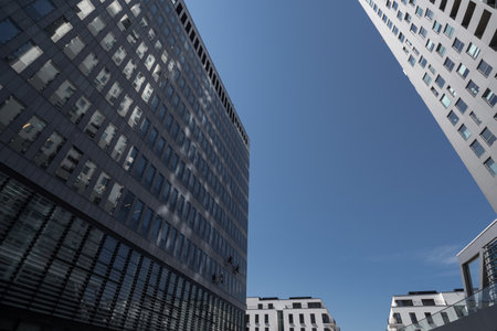 ARCHITECTURAL COMPLEX AND INDUSTRIAL CLIMBERS WASH WINDOWS - A modern tall residential building...