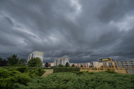 RAINY WEATHER - Dramatic rain clouds over the cityの写真素材