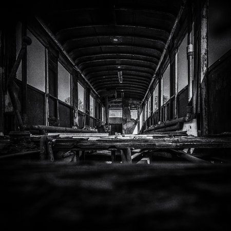NARROW GAUGE DIESEL RAILCAR - The interior of an old, rusty wreck of a passenger transport vehicle