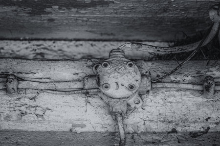 JUNCTION BOX - An antiquated surface electrical installation on a wooden building structure