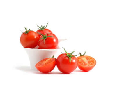Cherry tomatoes over whiteの写真素材