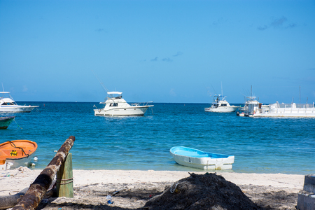 White boat makes fishing with spinning on a large sea fishの写真素材