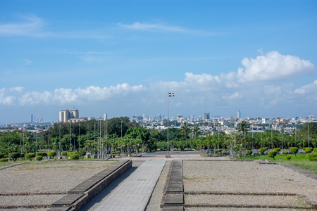 Beautiful view from the square to the big city with a blue sky and white cloudsの写真素材