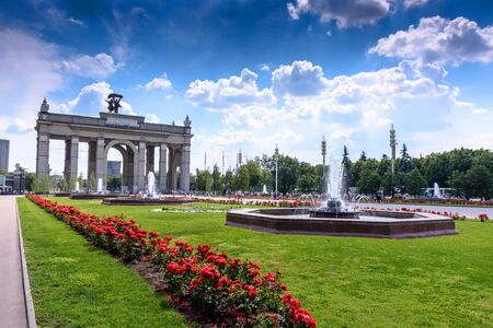 MOSCOW, RUSSIA - May 15, 2016: VDNH park beautiful landscape with flowers, fountains and buildingsのeditorial素材