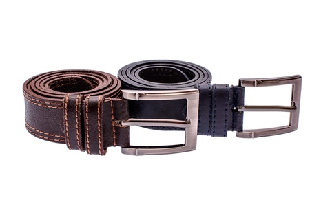 Several fashionable men's leather belts gray brown isolated on white background.の写真素材