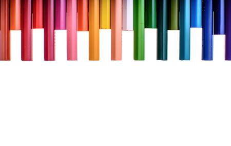 Many colored pencils isolated on white background, place for text.の写真素材