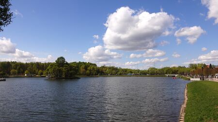 Beautiful clean European park with a beautiful view of the lake.の写真素材