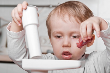 Meat Grinders , little boy cutting meatの写真素材