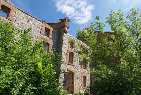 View of old red brick building ruinの写真素材