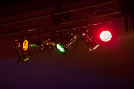 Red, yellow, green floodlights at the disco