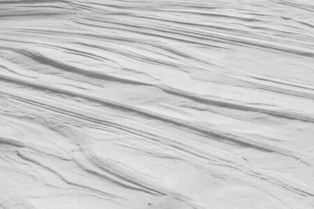 Natural texture of white snow as backgroundの写真素材