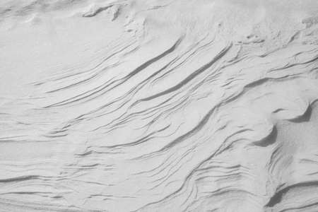 Natural texture of white snow as backgroundの写真素材