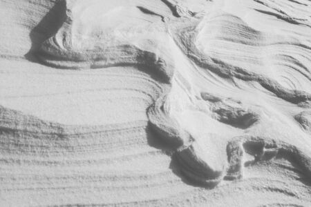 Natural texture of white snow as backgroundの写真素材