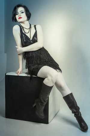 Toned portrait of stylish young beautiful woman