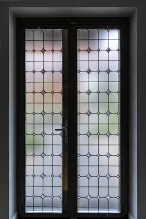 Vintage glass front door, view from the inside of the room