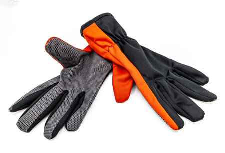 A pair of protective gardening gloves isolated on a white backgroundの写真素材