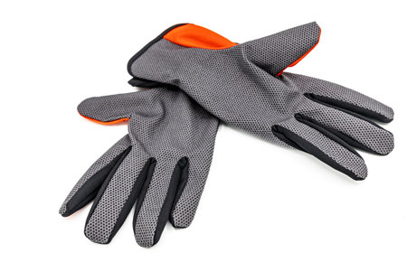 A pair of protective gardening gloves isolated on a white backgroundの写真素材
