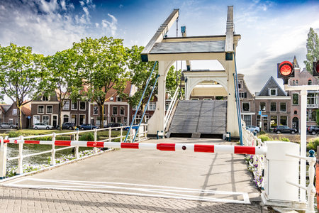 Weesp, Netherlands, June 18th, 2022: A drawbridge across a canal in the Netherlandsの写真素材