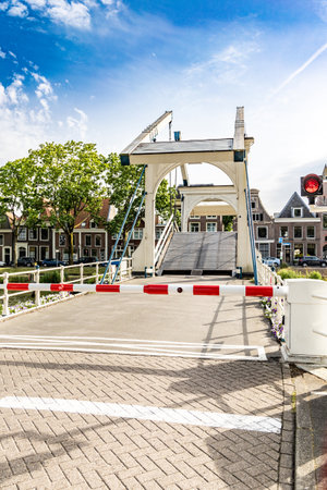 Weesp, Netherlands, June 18th, 2022: A drawbridge across a canal in the Netherlandsの写真素材
